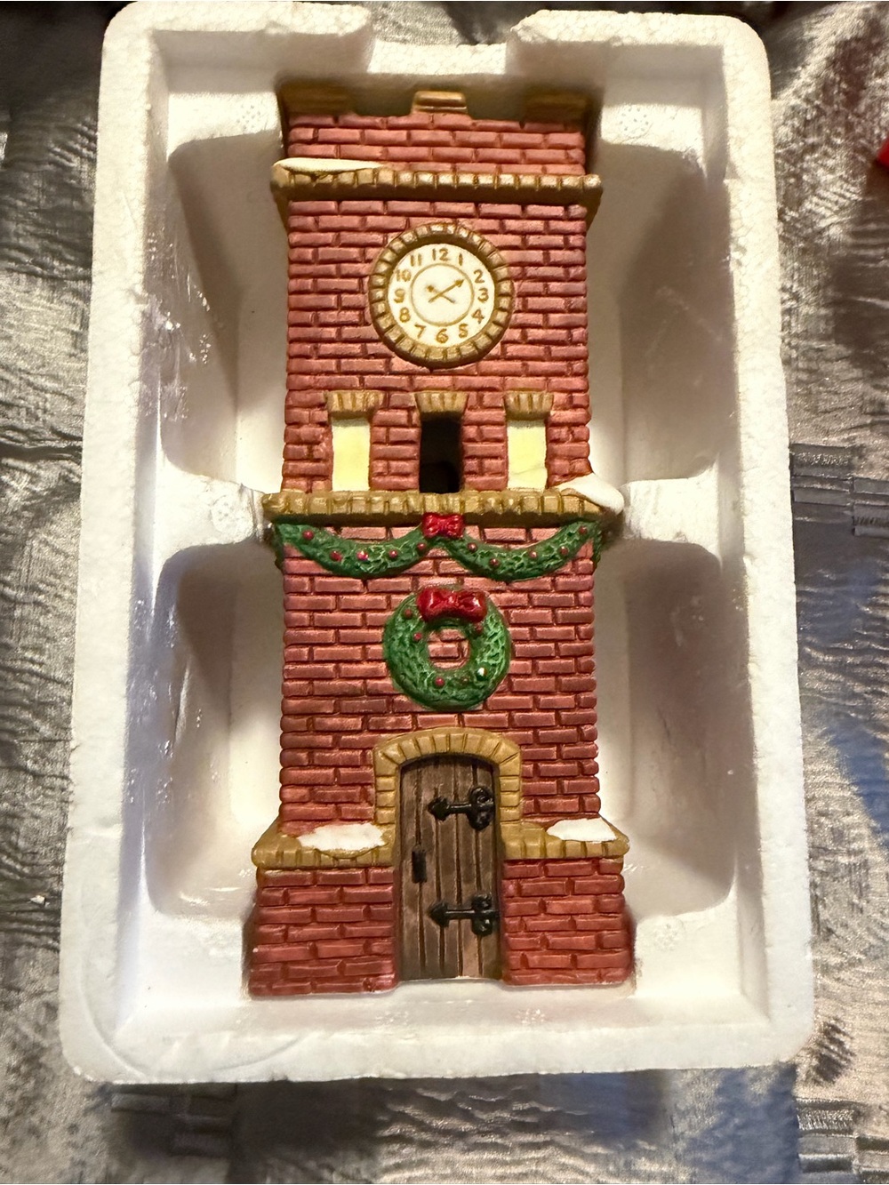 Dickens Red Brick Clock Tower Holiday Ornament with Green Wreath